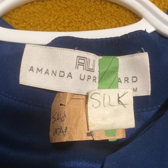 Used boutique dress needs a little love, has a small burn hole at bottom - Picture 6 of 6